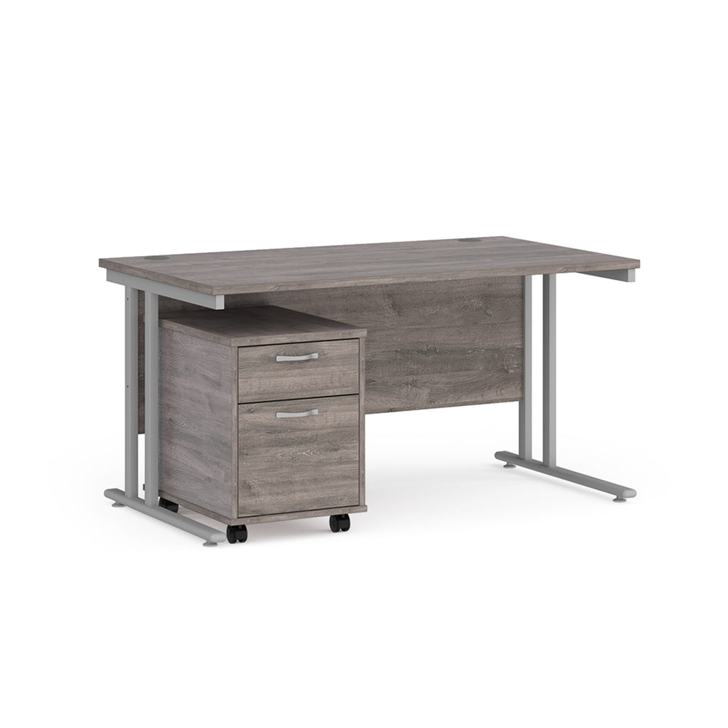 Wooden desk with metal legs and a drawer on a white background