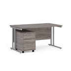 Wooden desk with metal legs and a drawer on a white background