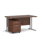 Wooden desk with a smaller drawer unit on a white background