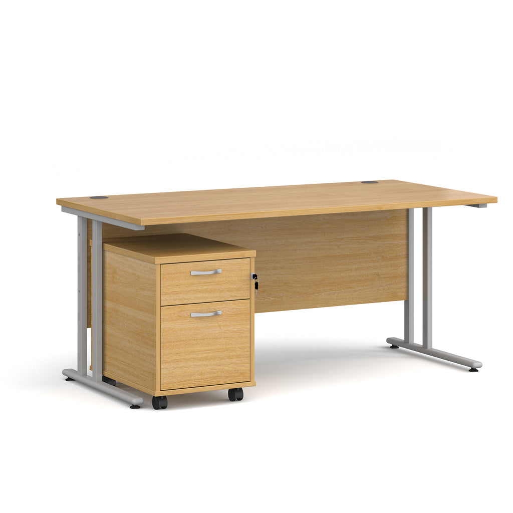 Wooden desk with a matching pedestal on a white background