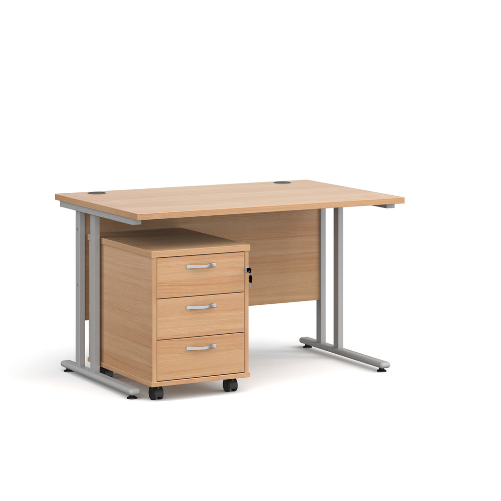 Wooden office desk with a metal frame and a matching pedestal on a white background