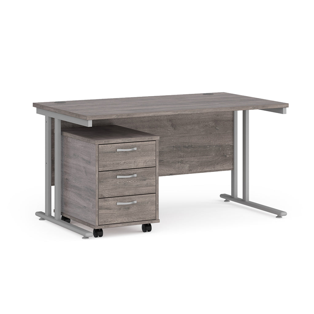Wooden office desk with a metal frame and a matching pedestal on a white background