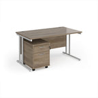 Wooden office desk with a metal frame on a white background