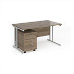 Wooden desk with metal legs on a white background