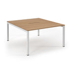 Square wooden table with white metal legs on a white background