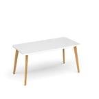 White table with wooden legs on a white background