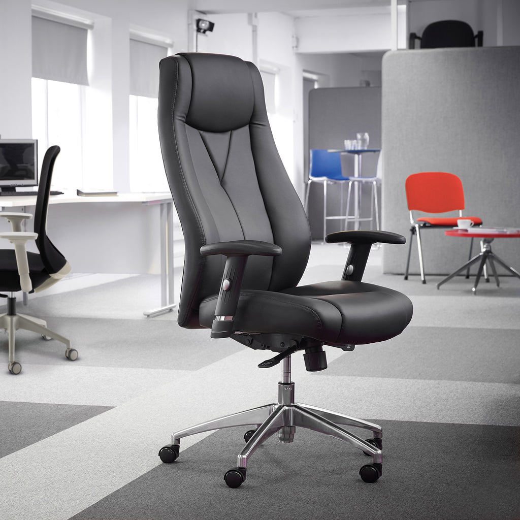 Black office chair in an office setting with other chairs in the background