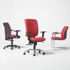 Set of red office chairs including task, operator, and visitor styles, shown against a white background for workspace seating options.