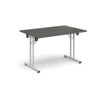Folding table with grey top and metal legs on a white background
