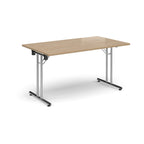 Folding table with wood-effect top and metal legs on a white background