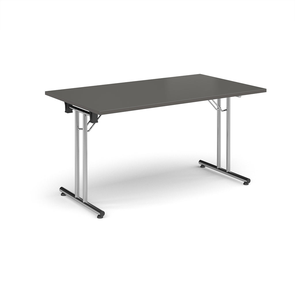 Folding table with grey top and metal legs on a white background