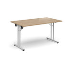 Folding table with wood-effect top and white metal legs on a white background