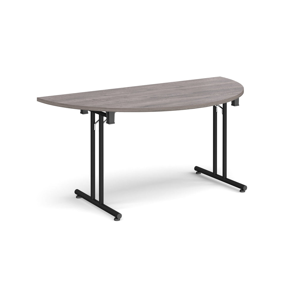 Semi-circular wooden flip-top table with black metal legs, shown against a white background. Ideal for flexible meeting or training room layouts.