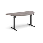 Semi-circular wooden flip-top table with black metal legs, shown against a white background. Ideal for flexible meeting or training room layouts.