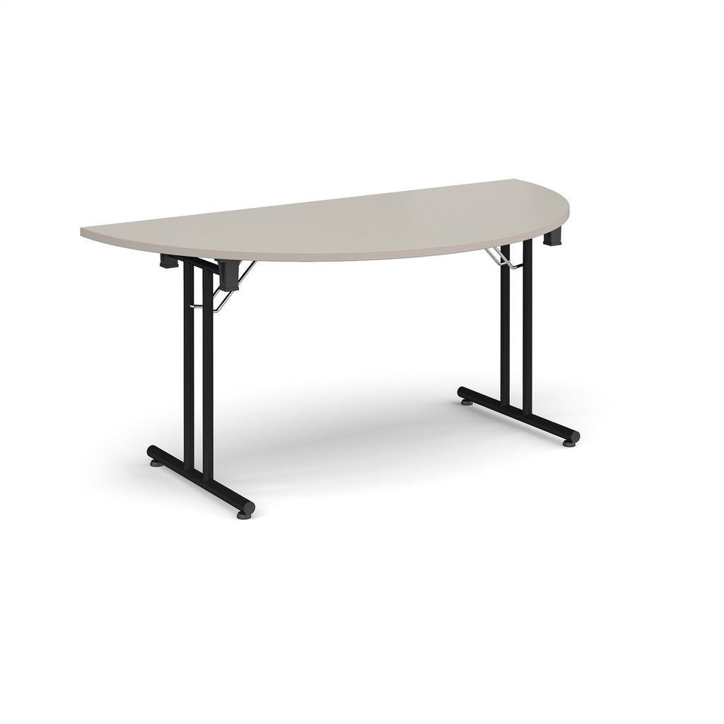 Semi-circular light grey flip-top table with black metal legs, shown against a white background. Ideal for flexible meeting or training room layouts.