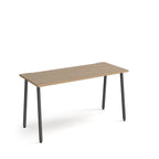 Minimalist rectangular office desk with wood-effect tabletop and angled black legs, shown against a white background.