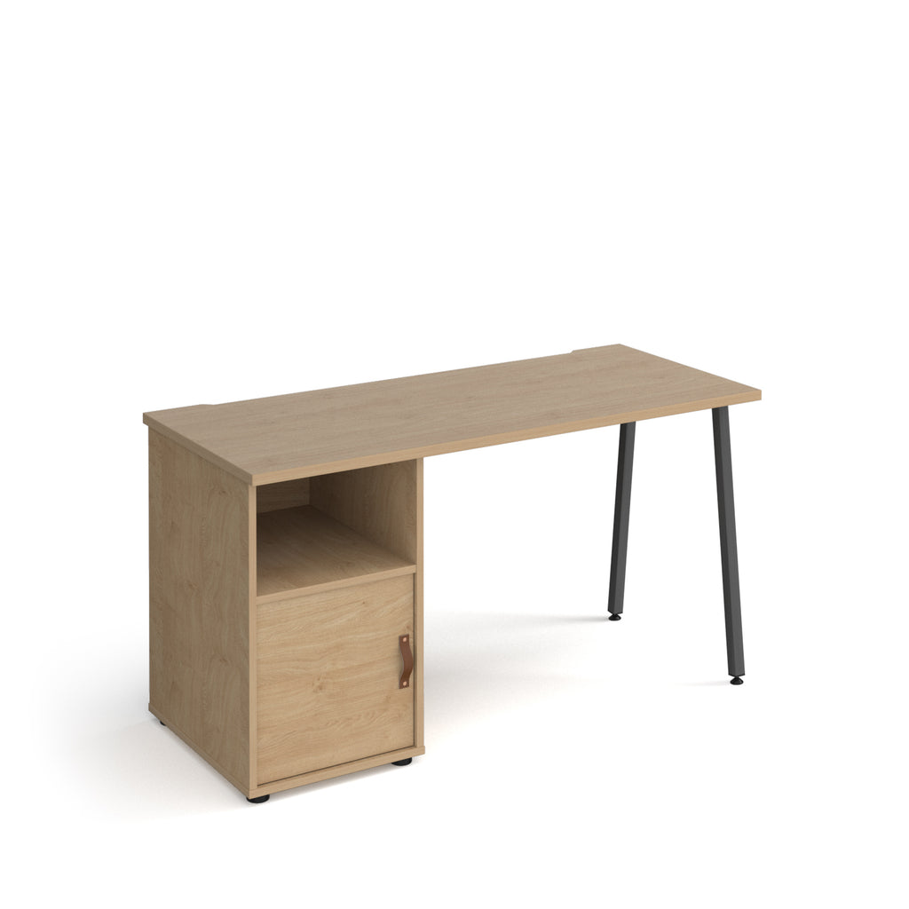 Office desk with oak-effect top, integrated storage cupboard, shelf, and black angled legs, shown against a white background.
