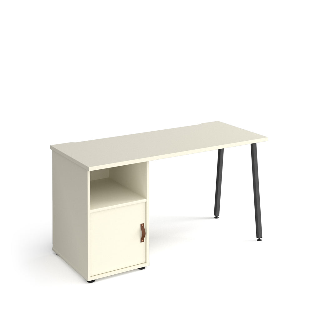 Office desk with white tabletop, integrated storage cupboard and shelf, and black angled legs, shown against a white background.