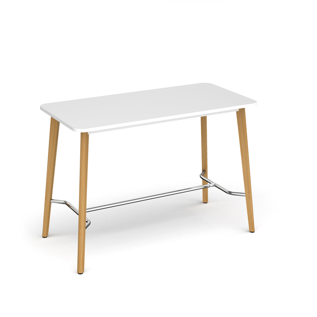 Rectangular table with white top, angled wooden legs, and chrome footrest bar, shown against a white background.