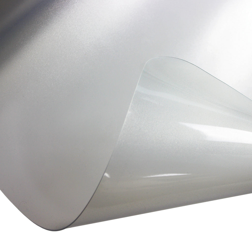 Close-up of a transparent office chair floor mat with a gently curved, flexible edge, showing a smooth protective surface.