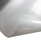 Close-up of a transparent office chair floor mat with a gently curved, flexible edge, showing a smooth protective surface.