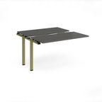 Modular bench desk add-on with a grey top, integrated cable access cut-out, and green metal legs, shown on a white background.