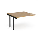 Modular bench desk add-on with a wood-effect top, integrated cable access cut-out, and black metal legs, shown on a white background.