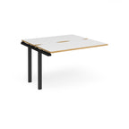 Modular bench desk add-on with white top with wood-effect edging, integrated cable access cut-out, and black metal legs, shown on a white background.