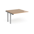 Modular bench desk add-on with a wood-effect top, integrated cable access cut-out, and silver metal legs, shown on a white background.