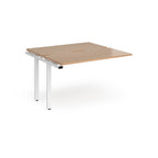 Modular bench desk add-on with a wood-effect top, integrated cable access cut-out, and white metal legs, shown on a white background.