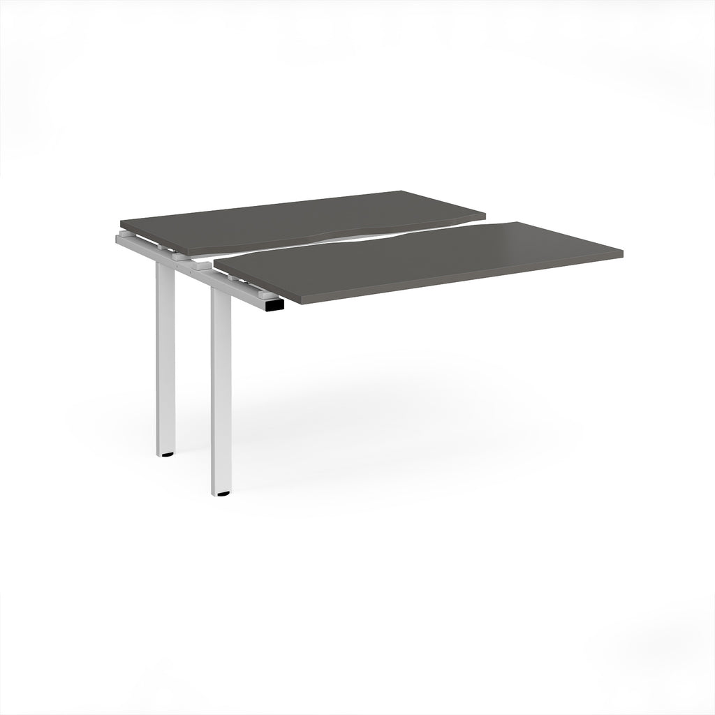 Modular bench desk add-on with a grey top, integrated cable access cut-out, and white metal legs, shown on a white background.