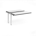 Modular bench desk add-on with a white top with black edging, integrated cable access cut-out, and white metal legs, shown on a white background.