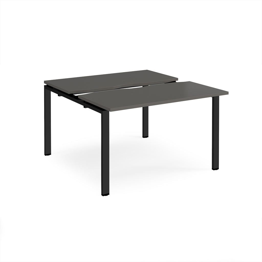 Two-person back-to-back office desk with grey worktops and black metal legs, shown against a white background.