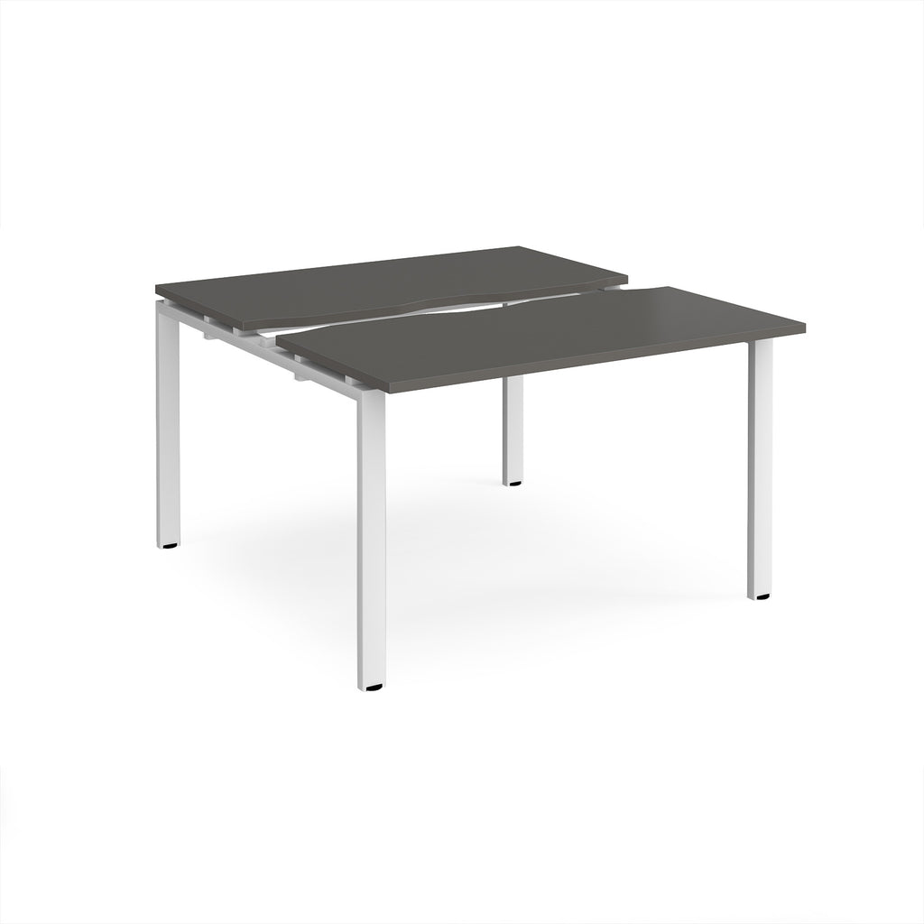 Two-person back-to-back office desk with grey worktops and white metal legs, shown against a white background.