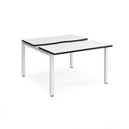 Two-person back-to-back office desk with white worktops, black edging, and white metal legs, shown against a white background.