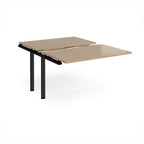 Large modular bench desk add-on with a wood-effect top and black metal legs, shown on a white background.