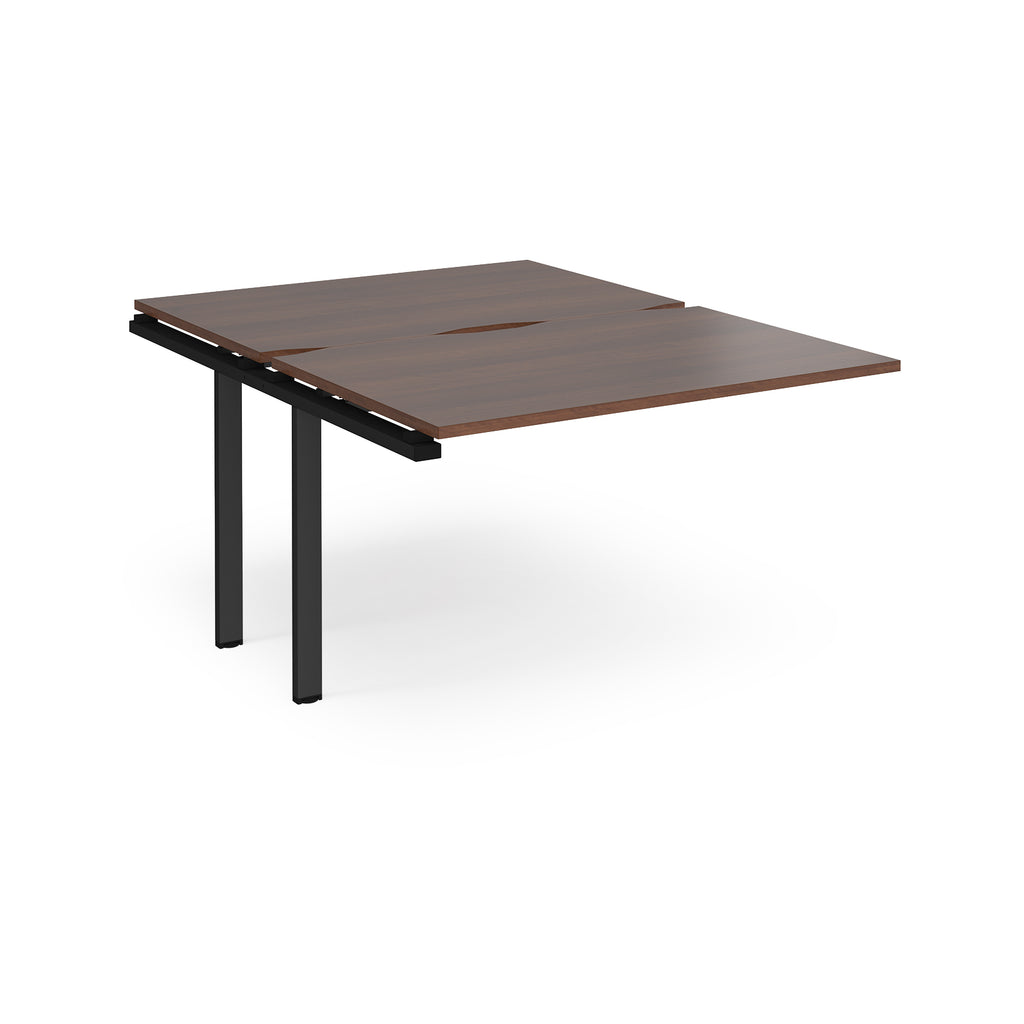 Large modular bench desk add-on with a dark wood-effect top and black metal legs, shown on a white background.