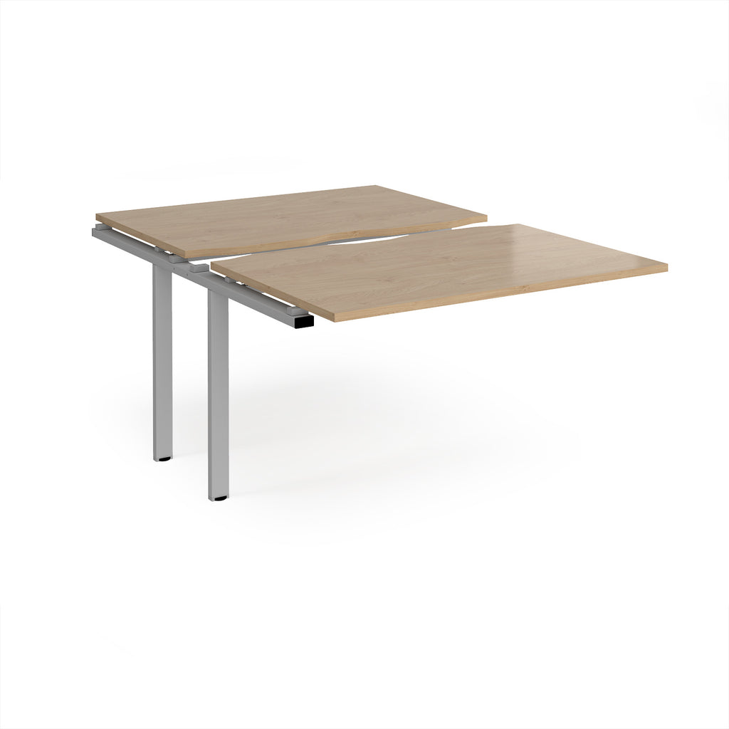 Large modular bench desk add-on with a wood-effect top and silver metal legs, shown on a white background.