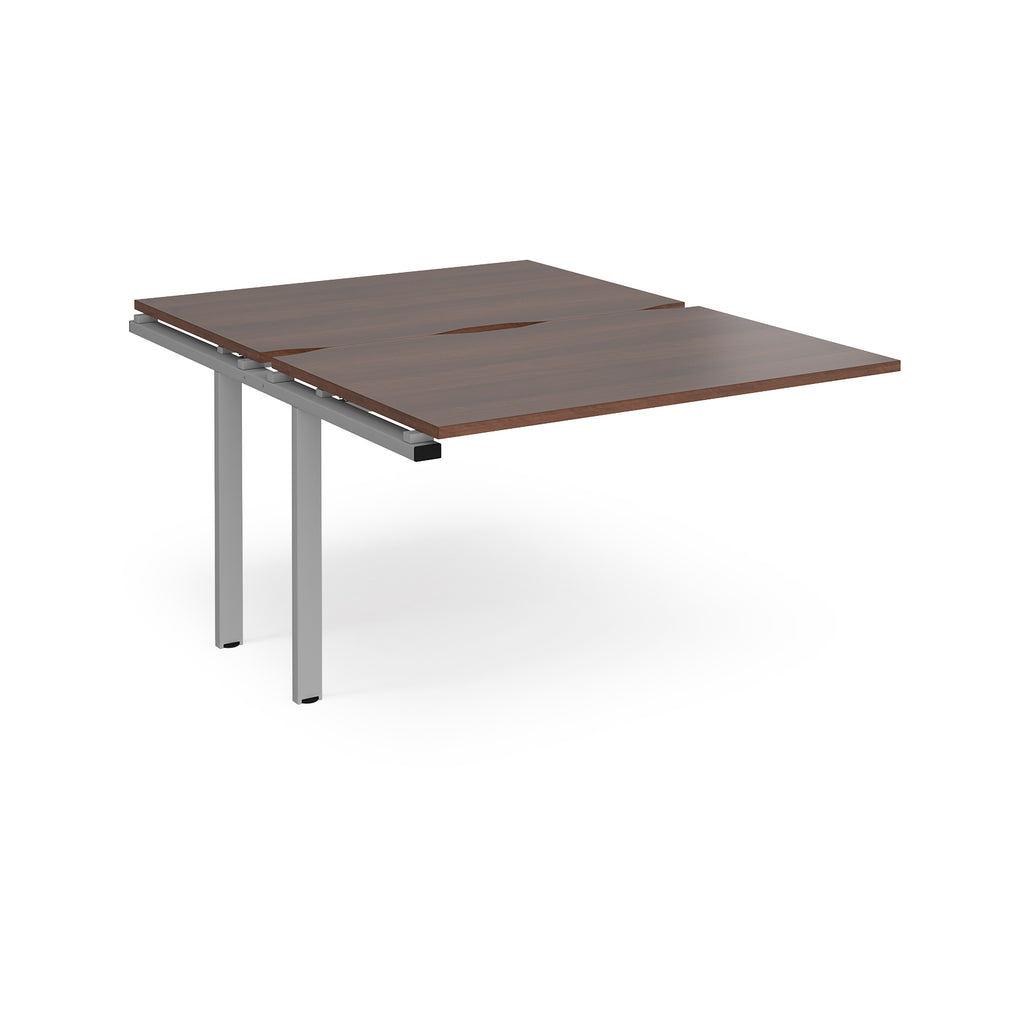 Large modular bench desk add-on with a dark wood-effect top and silver metal legs, shown on a white background.