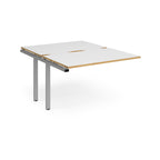 Large modular bench desk add-on with a white top with wood-effect edge, and silver metal legs, shown on a white background.
