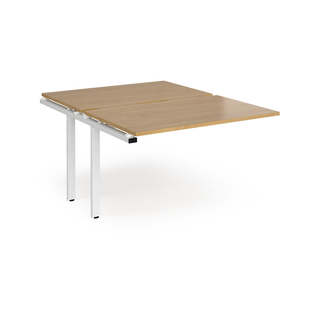 Large modular bench desk add-on with a wood-effect top and white metal legs, shown on a white background.