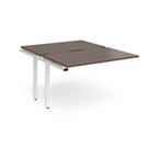 Large modular bench desk add-on with a dark wood-effect top and white metal legs, shown on a white background.