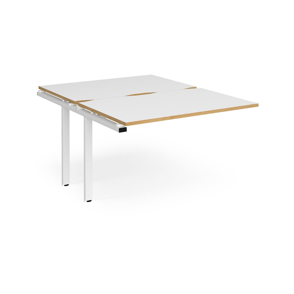 Large modular bench desk add-on with a white top with wood-effect edge, and white metal legs, shown on a white background.