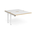 Large modular bench desk add-on with a white top with wood-effect edge, and white metal legs, shown on a white background.