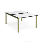Large modular bench desk with white panels and black edging, integrated cable access cut-outs, and green metal legs, shown on a white background.
