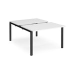 Large modular bench desk with a white top, integrated cable access cut-out, and black metal legs, shown on a white background.