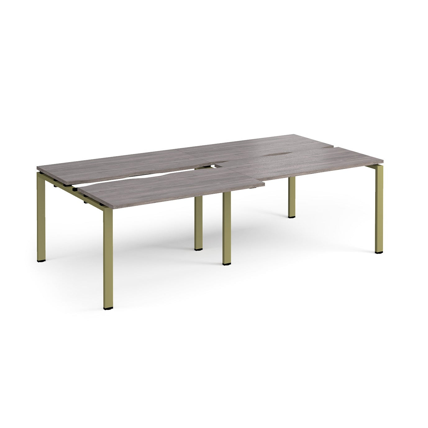 Large modular bench desk with a grey wood-effect top, integrated cable access slots, and green metal legs, shown on a white background.
