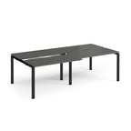Large modular bench desk with a grey worktop, integrated cable access cut-outs, and black metal legs, shown on a white background.
