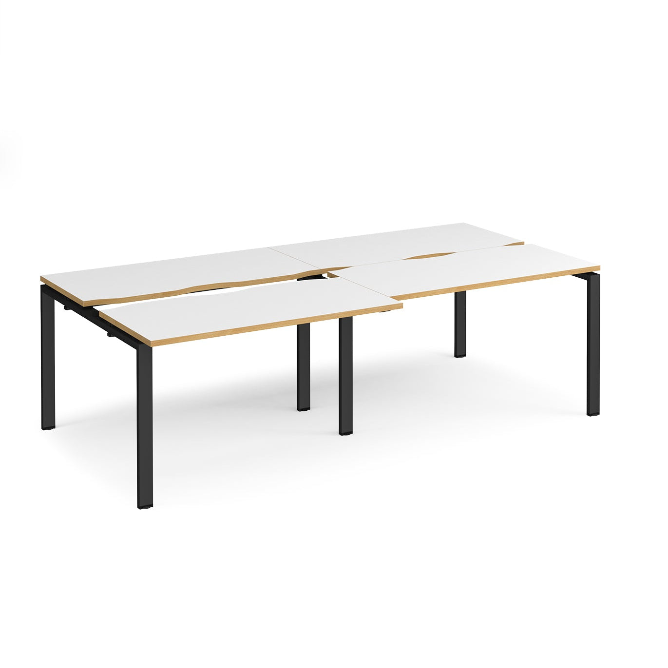 Large modular bench desk with white panels and wood-effect edging, integrated cable access cut-outs, and black metal legs, shown on a white background.