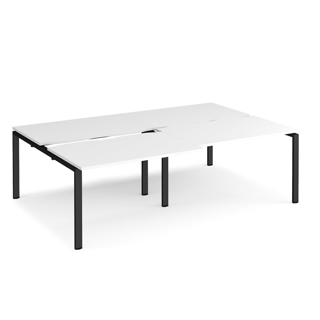 Large modular conference table with a clean white finish, integrated cable access cut-outs, and black metal legs, shown on a white background.